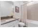 Clean bathroom with single vanity, shower/tub combo, and updated fixtures at 11725 Language Way, Orlando, FL 32832