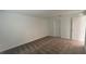 Spacious bedroom with neutral carpeting and ample wall space at 1963 Turtle Dove Ln, Kissimmee, FL 34746