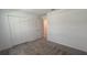 Spacious bedroom with double door closet and neutral carpeting at 1963 Turtle Dove Ln, Kissimmee, FL 34746