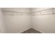 Walk-in closet with wire shelving offers convenient storage at 1963 Turtle Dove Ln, Kissimmee, FL 34746