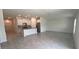Modern kitchen with white cabinets, stainless steel appliances and island at 1963 Turtle Dove Ln, Kissimmee, FL 34746