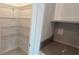 Walk-in pantry with wire shelving provides ample storage space at 1963 Turtle Dove Ln, Kissimmee, FL 34746