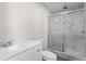 Clean bathroom with white vanity and marble shower at 3743 Red Oak Ct, Lake Wales, FL 33898