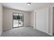 Bright bedroom with sliding glass door and ample closet space at 3743 Red Oak Ct, Lake Wales, FL 33898