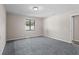 Spacious bedroom with grey carpeting and neutral walls at 3743 Red Oak Ct, Lake Wales, FL 33898