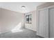 Well-lit bedroom featuring a window and closet at 3743 Red Oak Ct, Lake Wales, FL 33898