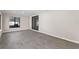 Spacious Gathering room featuring tile floors and sliding glass doors at 3743 Red Oak Ct, Lake Wales, FL 33898