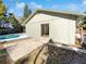 Newly painted house exterior with a patio and pool access at 4026 Tenita Dr, Winter Park, FL 32792