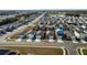 Aerial view showcasing a neighborhood with various houses and landscaping at 4815 Rigging St, Haines City, FL 33844