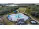 Community pool, playground, and dog park in a new development at 4815 Rigging St, Haines City, FL 33844