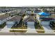 Aerial perspective of houses with a blue tarp on one roof at 4815 Rigging St, Haines City, FL 33844