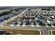 Wide aerial view of a residential neighborhood with a focus on one property at 4815 Rigging St, Haines City, FL 33844