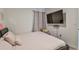 Spacious bedroom featuring a comfortable bed and large TV at 4815 Rigging St, Haines City, FL 33844