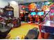 Fun game room with arcade games and air hockey at 8979 Azalea Sands Ln, Davenport, FL 33896