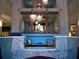 Elegant lobby with a granite reception desk at 8979 Azalea Sands Ln, Davenport, FL 33896