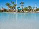Community pool with a waterslide at 8979 Azalea Sands Ln, Davenport, FL 33896