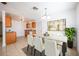 Bright dining area with a marble table and six chairs at 1307 Kozart St, Orlando, FL 32811