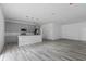 Modern kitchen with gray cabinets, island, and stainless steel appliances at 16921 Sw 25Th Ct, Ocala, FL 34473