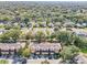 Wide aerial view of townhouses nestled in a quiet neighborhood, offering a peaceful atmosphere at 2020 Retreat View Cir, Sanford, FL 32771