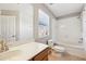 Clean bathroom with tub, toilet and vanity at 2020 Retreat View Cir, Sanford, FL 32771