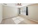 Bright bedroom featuring a ceiling fan and large window at 2020 Retreat View Cir, Sanford, FL 32771