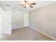 Simple bedroom with neutral decor and ceiling fan at 2020 Retreat View Cir, Sanford, FL 32771