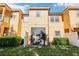 Back exterior view of townhome with patio at 2020 Retreat View Cir, Sanford, FL 32771