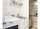 Laundry room with washer, dryer and shelving at 2020 Retreat View Cir, Sanford, FL 32771