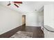 Open concept living area with dark hardwood floors, and a staircase at 2020 Retreat View Cir, Sanford, FL 32771