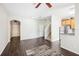 Open concept living room, kitchen, and entryway with dark hardwood floors at 2020 Retreat View Cir, Sanford, FL 32771
