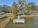 Private dock providing convenient lake access with scenic views at 3430 Laurel Dr, Mount Dora, FL 32757