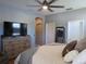 Main bedroom with private access to bathroom at 10198 Oak Crest Rd, Orlando, FL 32829