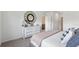 Comfortable bedroom with a dresser and a queen-size bed at 1304 Hanoverian Dr, Lake Alfred, FL 33850