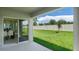 Patio overlooking a fenced backyard at 1304 Hanoverian Dr, Lake Alfred, FL 33850