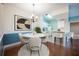 Dining room with round table and kitchen passthrough at 14304 Fredricksburg Dr # 408, Orlando, FL 32837