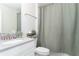 Bathroom with a shower/tub combo and gray countertop at 1593 Mulligan Blvd, Davenport, FL 33896