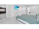 Spacious bedroom with a modern aesthetic and ample natural light, featuring a view of the kitchen at 2561 Montego Bay Blvd, Kissimmee, FL 34746