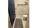 Modern bathroom with white hexagonal floor tile and a walk-in shower at 3420 Lake Harney Cir, Geneva, FL 32732