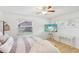 Bedroom with light and airy feel, featuring a comfortable bed and large windows at 3420 Lake Harney Cir, Geneva, FL 32732