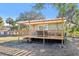 Guest house with a pergola-covered deck at 3420 Lake Harney Cir, Geneva, FL 32732