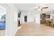 Bright living room with fireplace, hardwood floors, and water views at 3420 Lake Harney Cir, Geneva, FL 32732