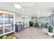 Screened porch with lake view and outdoor grill at 3420 Lake Harney Cir, Geneva, FL 32732