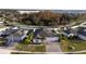 House with solar panels and a large backyard in a residential neighborhood at 402 Blue Lake Cir, Kissimmee, FL 34758
