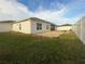 Large backyard with grassy area and an empty pool base at 402 Blue Lake Cir, Kissimmee, FL 34758