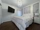 Spacious Primary bedroom with a large bed and closet at 402 Blue Lake Cir, Kissimmee, FL 34758