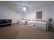 Large bedroom with two twin beds and a crib at 402 Blue Lake Cir, Kissimmee, FL 34758