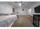 Spacious bedroom with two twin beds and a TV at 402 Blue Lake Cir, Kissimmee, FL 34758