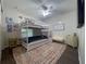 bedroom with bunk beds, a dresser, and a TV at 402 Blue Lake Cir, Kissimmee, FL 34758