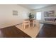 Bright dining room with a round table and modern chairs at 402 Blue Lake Cir, Kissimmee, FL 34758