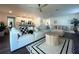 Open concept living space with comfortable seating and a stylish coffee table at 402 Blue Lake Cir, Kissimmee, FL 34758